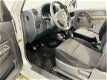 Suzuki Jimny - Hard Top 1.3 16V 4WD Airco - 1 - Thumbnail