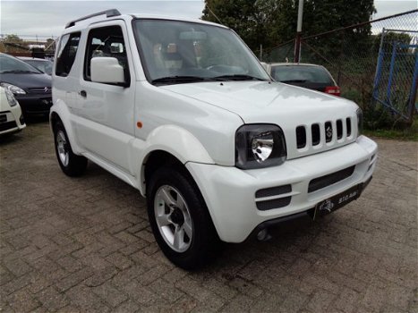 Suzuki Jimny - 1.3 EXCLUSIVE 4 WD / UNIEK 42.793 KM-NAP / AIRCO / ELEK PAKKET / LM VLG / AFN.TREKHAA - 1