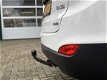 Hyundai ix35 - 2.0i 4WD Business Edition EEC Navigatie Cruise control Trekhaak 1900 kg L.M. velgen - 1 - Thumbnail