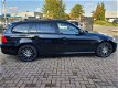 BMW 3-serie Touring - 318i High Executive Navi pro/xenon/panoramdak/sportstoelen/half leer zwart, vo - 1 - Thumbnail