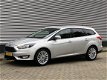 Ford Focus Wagon - 1.0 EcoBoost 100pk Titanium | Navigatie met bluetooth | Parkeersensoren voor en a - 1 - Thumbnail