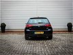 Volkswagen Golf - 1.6 TDI Comfortline | Clima | Navi | Cruise | Lichtmetaal | Trekhaak | Pdc voor+ac - 1 - Thumbnail