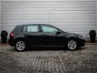 Volkswagen Golf - 1.6 TDI Comfortline | Clima | Navi | Cruise | Lichtmetaal | Trekhaak | Pdc voor+ac - 1 - Thumbnail