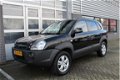 Hyundai Tucson - 2.0i 4WD Style Airco N.A.P - 1 - Thumbnail