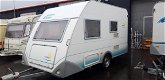 3 PERSOONS STAPELBED CARAVAN BJ 2001 EIFELLAND 350 MET NETTE VOORTENT - 2 - Thumbnail