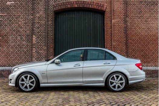 Mercedes-Benz C-klasse - 180 AMG Automaat Xenon | Navi | PDC V+A | Clima | 18'' LMV | NL 1e Eig. Aut - 1