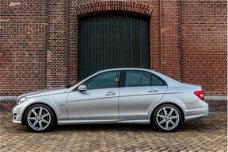 Mercedes-Benz C-klasse - 180 AMG Automaat Xenon | Navi | PDC V+A | Clima | 18'' LMV | NL 1e Eig. Aut
