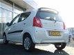 Suzuki Alto - 1.0 EXCLUSIVE AIRCO PDC LMV NL-AUTO - 1 - Thumbnail