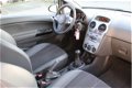Opel Corsa - 1.2-16V Cosmo OPC pakket Airco/Cruise control/Half lederen bekleding/Dealeronderhouden - 1 - Thumbnail