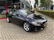 BMW 3-serie - 320i Automaat Leer Xenon Navi - 1 - Thumbnail