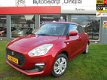 Suzuki Swift - 1.2 Comfort Met fabriek Garantie - 1 - Thumbnail