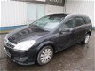 Opel Astra - 1.7 CDTI , combi , Navi , Airco , lederen bekleding - 1 - Thumbnail