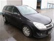 Opel Astra - 1.7 CDTI , combi , Navi , Airco , lederen bekleding - 1 - Thumbnail