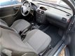Opel Corsa - 1.2-16V Essentia Airco/apk Goed rijdend auto - 1 - Thumbnail