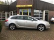 Opel Astra Sports Tourer - 1.4 Edition , Airco, Cruise Control, Dakdragers - 1 - Thumbnail