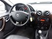 Dacia Duster - 1.6 Aniversare LPG 2wd Leder Airco Trekhaak NL-geleverd - 1 - Thumbnail