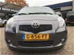 Toyota Yaris - 1.3 VVTi Terra *AIRCO*NAV.*STUURBEKR.*ELEKTR. RAMEN*BOEKJES*PDC*MF-STUUR - 1 - Thumbnail