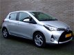 Toyota Yaris - 1.5 Hybrid Lease - Cruise - Climate - LM velgen - 1 - Thumbnail