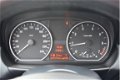 BMW 1-serie - 118i EffDyn. Ed. Business Line Ultimate Edition Navigatie I Airco I Sport velgen I Lee - 1 - Thumbnail