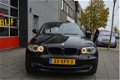 BMW 1-serie - 118i EffDyn. Ed. Business Line Ultimate Edition Navigatie I Airco I Sport velgen I Lee - 1 - Thumbnail