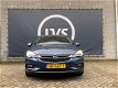 Opel Astra Sports Tourer - 1.4 Innovation - AIRCO ECC - NAVI - CARPLAY - CAMERA ACHTER - HALF LEDER - 1 - Thumbnail