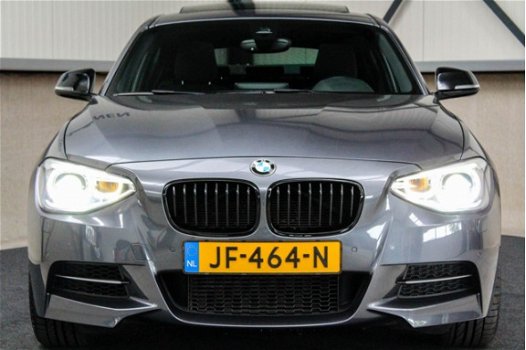 BMW 1-serie - M135i xDrive High Executive ✅320pk 6-cilinder Dealer|M Performance|Schuifdak|Navi|Came - 1