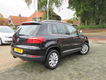 Volkswagen Tiguan - 1.4 TSI SportenStyle - 1 - Thumbnail