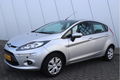 Ford Fiesta - 1.4 Titanium | PDC / LED / MF-STUUR / NETTE AUTO - 1 - Thumbnail