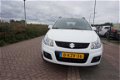 Suzuki SX4 - 1.6 COMFORT PERF.STAAT + WINTERSET AIRCO TREKHAAK 16INCH LMV DAKRAILS CARKIT PARROT ELE - 1 - Thumbnail