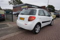 Suzuki SX4 - 1.6 COMFORT PERF.STAAT + WINTERSET AIRCO TREKHAAK 16INCH LMV DAKRAILS CARKIT PARROT ELE - 1 - Thumbnail