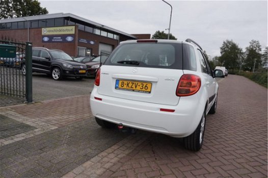 Suzuki SX4 - 1.6 COMFORT PERF.STAAT + WINTERSET AIRCO TREKHAAK 16INCH LMV DAKRAILS CARKIT PARROT ELE - 1