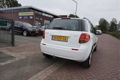 Suzuki SX4 - 1.6 COMFORT PERF.STAAT + WINTERSET AIRCO TREKHAAK 16INCH LMV DAKRAILS CARKIT PARROT ELE - 1 - Thumbnail