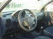 Opel Corsa - 1.2 16V Comfort - 1 - Thumbnail