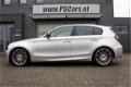 BMW 1-serie - 130I //M Performance H. EXEC. M-Pakket Sp.Leder/Schuifdak/PDC/Velgen LIEFHEBBERS AUTO - 1 - Thumbnail