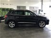 Volkswagen Tiguan - 1.4 TSI R Line Edition Sport&Style Airco | Navigatie | Cruise Control | Elektris - 1 - Thumbnail