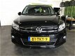 Volkswagen Tiguan - 1.4 TSI R Line Edition Sport&Style Airco | Navigatie | Cruise Control | Elektris - 1 - Thumbnail