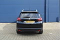 Peugeot 2008 - STYLE 1.2 PURETECH 82PK | LM VELGEN | NAVIGATIE | DAB+ | PANORAMADAK - 1 - Thumbnail