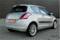 Suzuki Swift - 1.2i Airco LM-velgen Stoelverw. NL-auto - 1 - Thumbnail