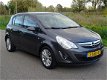 Opel Corsa - 1.4-16V 101pk Cosmo navigatie. lmv. pdc - 1 - Thumbnail