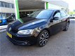 Volkswagen Jetta - 2.0 TDI Highline AUTOMAAT LEER - 1 - Thumbnail