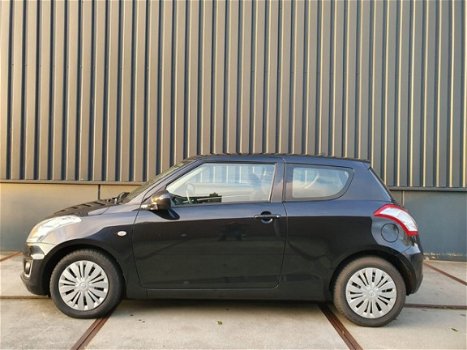 Suzuki Swift - 1.2 Comfort EASSS 52772km airco nu aanbieding bij geen inruil 8250 - 1