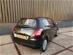 Suzuki Swift - 1.2 Comfort EASSS 52772km airco nu aanbieding bij geen inruil 8250 - 1 - Thumbnail