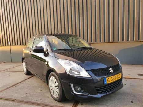 Suzuki Swift - 1.2 Comfort EASSS 52772km airco nu aanbieding bij geen inruil 8250 - 1