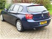 BMW 1-serie - 118d Upgrade Edition NAVI 2E EiG DEALER ONDERHOUDEN XENON - 1 - Thumbnail