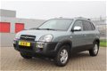 Hyundai Tucson - 2.0i Dynamic AIRCO - 1 - Thumbnail