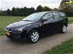 Ford Focus Wagon - 1.6 TDCI Ambiente - 1 - Thumbnail