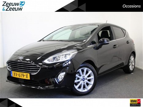 Ford Fiesta - 1.0 EcoBoost 100 PK Titanium | Navi | Parkeersensoren v + a | Voorruitverwarming | - 1