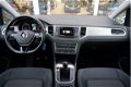 Volkswagen Golf Sportsvan - 1.0 TSI 115pk Comfortline + Trekhaak + Navigatie + PDC - 1 - Thumbnail