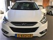 Hyundai ix35 - 1.6i Style *NAVIGATIE*LEDER*STOEL VERW*CRUIS-CONTROL - 1 - Thumbnail