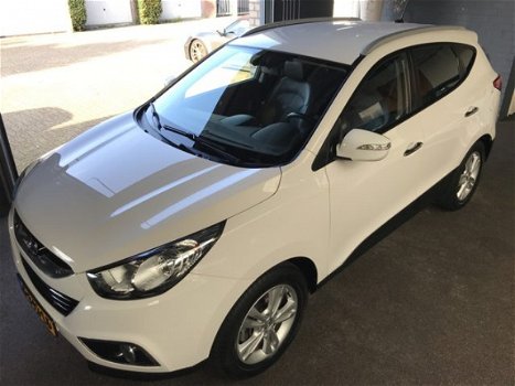 Hyundai ix35 - 1.6i Style *NAVIGATIE*LEDER*STOEL VERW*CRUIS-CONTROL - 1